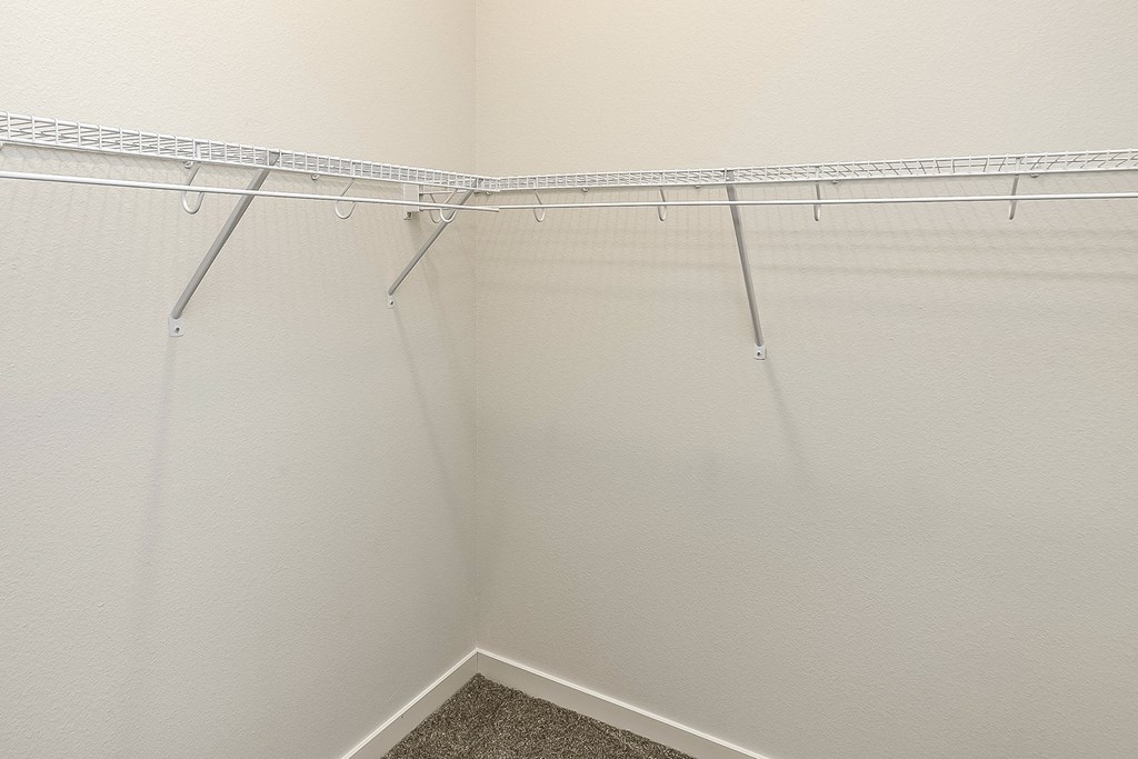 New building with white and dark color schemes with one, two and three bedroom apartment homes at CopperCreek Apartments in Council Bluffs, IA