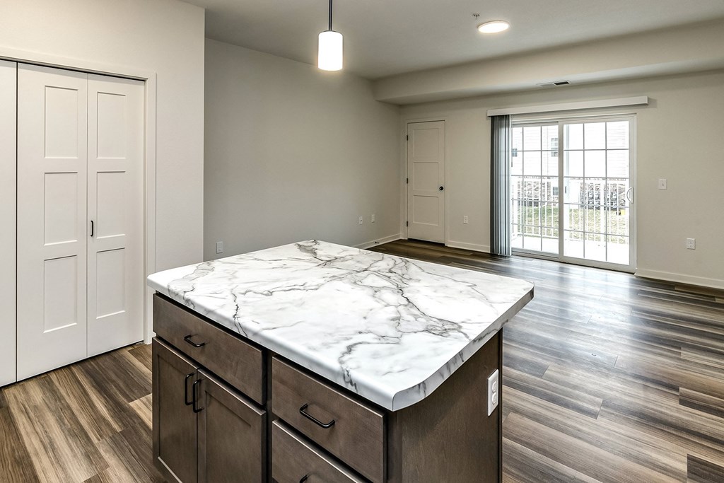 New building with white and dark color schemes with one, two and three bedroom apartment homes at CopperCreek Apartments in Council Bluffs, IA