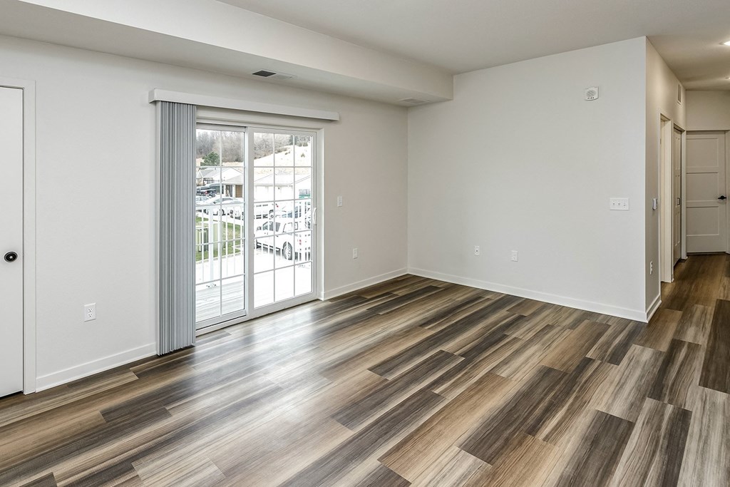 New building with white and dark color schemes with one, two and three bedroom apartment homes at CopperCreek Apartments in Council Bluffs, IA