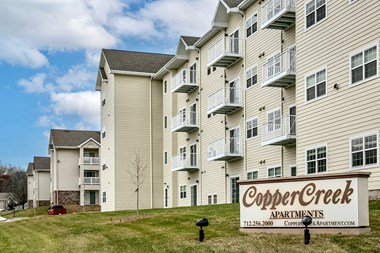 Property Exterior at CopperCreek Apartments in Council Bluffs, IA