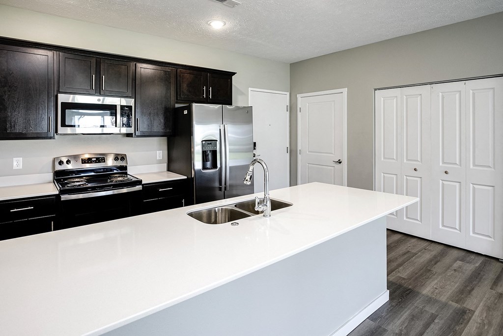 Kitchen with stainless steel appliances at Cross Creek in Lexington, NE