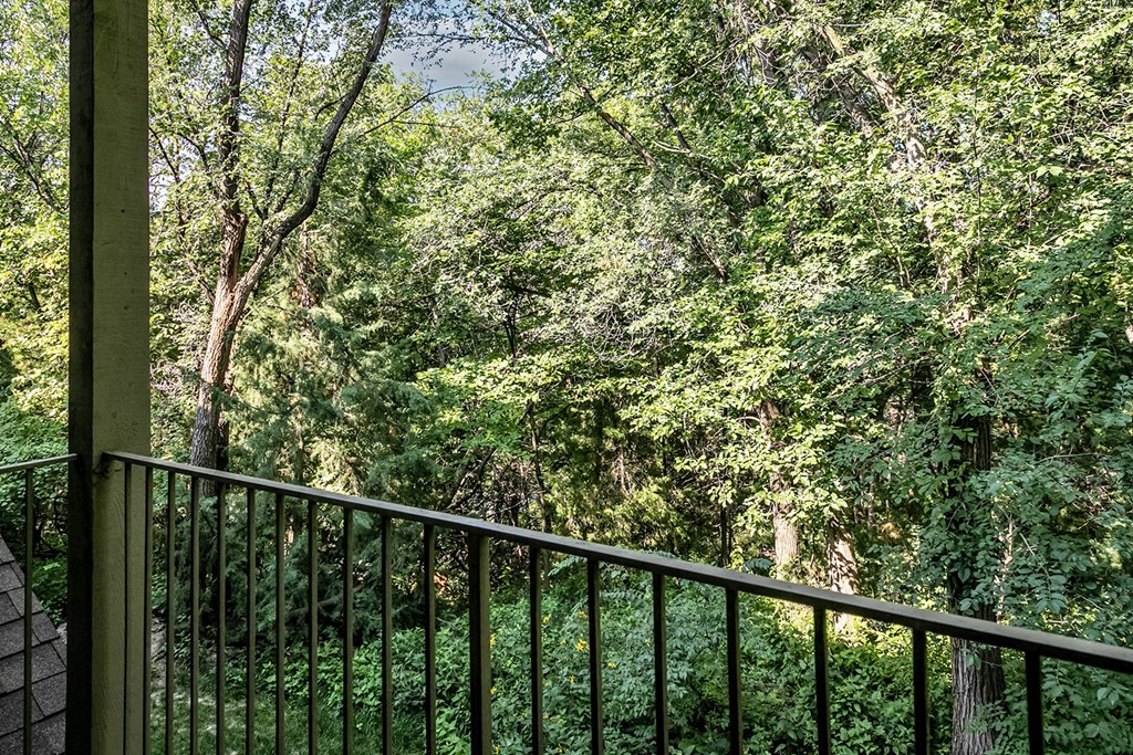 Balcony with an excellent view of nature  at Deer Park Apartments in Council Bluffs, IA