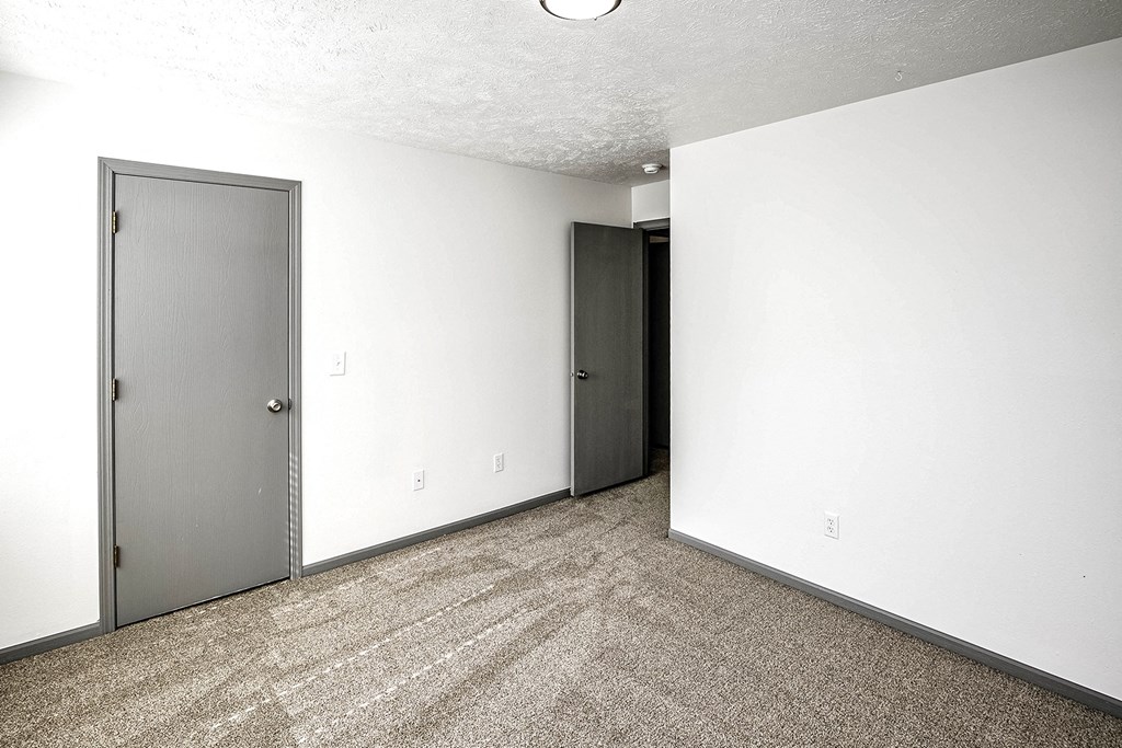 Bedroom at Deer Park Apartments in Council Bluffs, IA