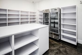 Package Room with Shelving with Cooling Storage at The Fireside at Waukee in Waukee, IA
