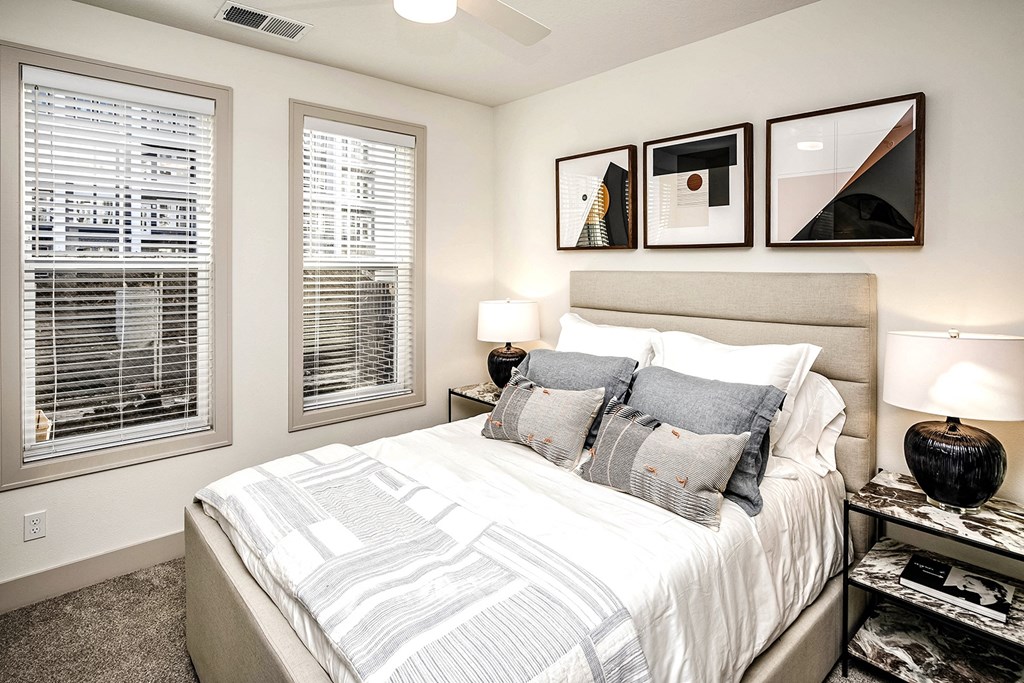 Studio, one, and two-bedroom apartment homes with stainless steel appliances, quarts countertops, designer cabinetry, large kitchens, luxury vinyl plank flooring, high vaulted ceilings, high-end lighting, in-unit washer and dryer, and energy efficient windows at Fireside at Waukee in Waukee, IA