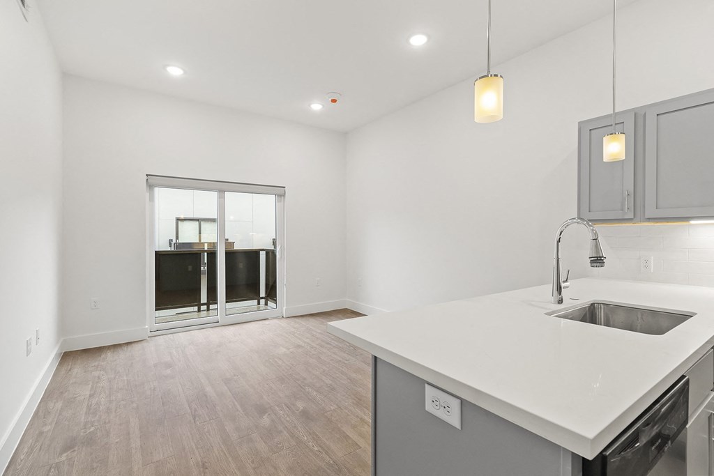 Large open kitchens with custom quartz countertops at G at Market in Bentonville, AR