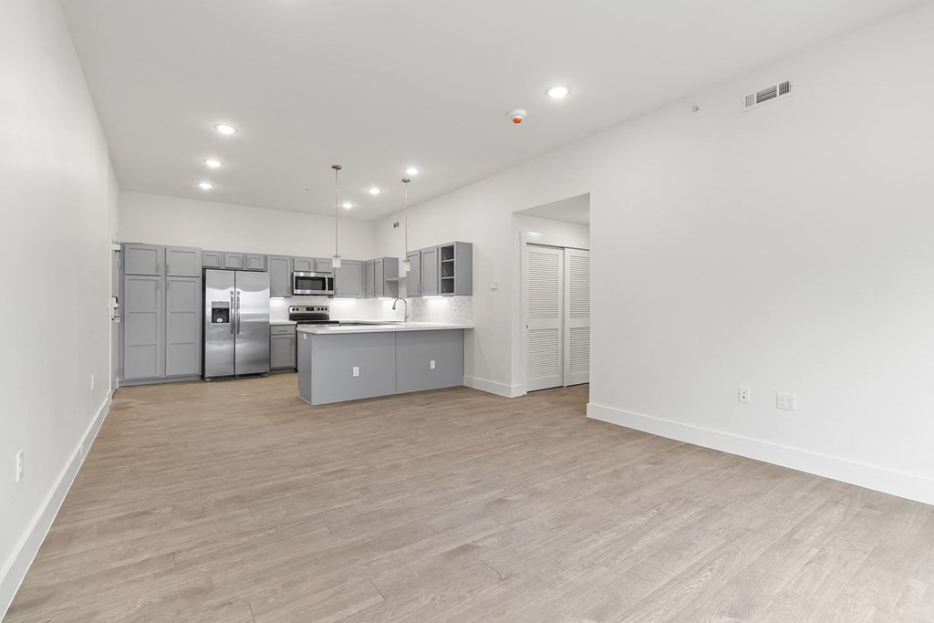 Large open kitchens with custom quartz countertops at G at Market in Bentonville, AR