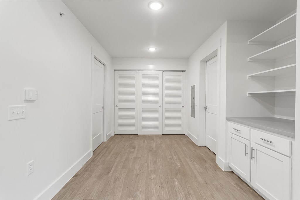 Large living spaces with built-in cabinets at G at Market in Bentonville, AR