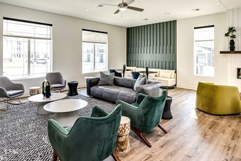 Clubhouse with a cozy lounge area at Hanover Flats in Bennington, NE