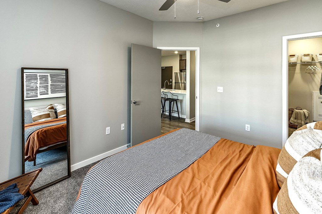 Bedroom with carpeted flooring at Hanover Flats in Bennington, NE