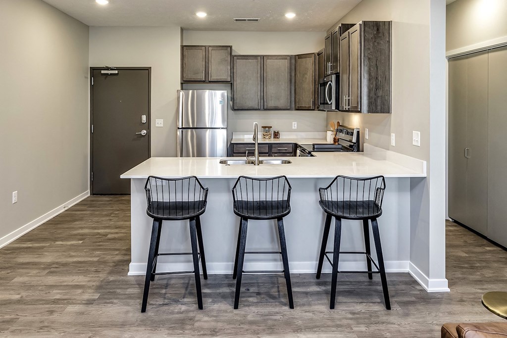 Kitchen with bar at Hanover Flats in Bennington, NE