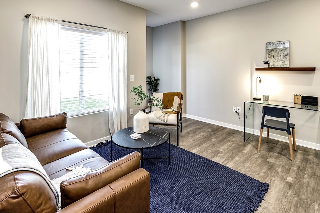 Living Room with natural lighting at Hanover Flats in Bennington, NE