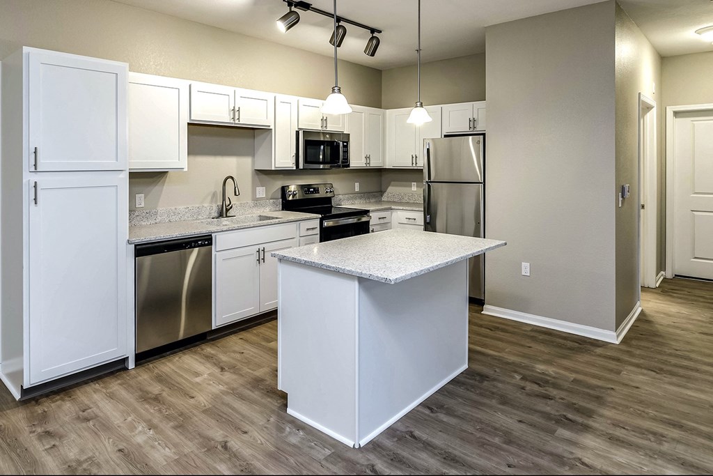 Large kitchen with white cabinets and stainless steel appliances at Legacy Commons, Omaha, NE, 68130