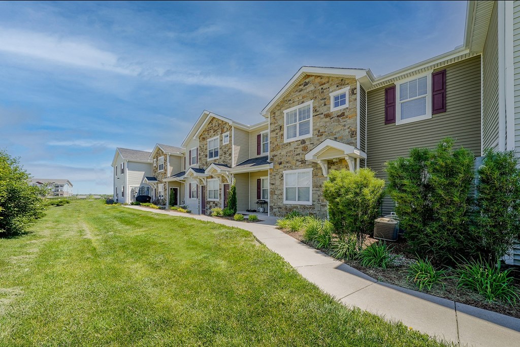 a row of houses on a sunny day