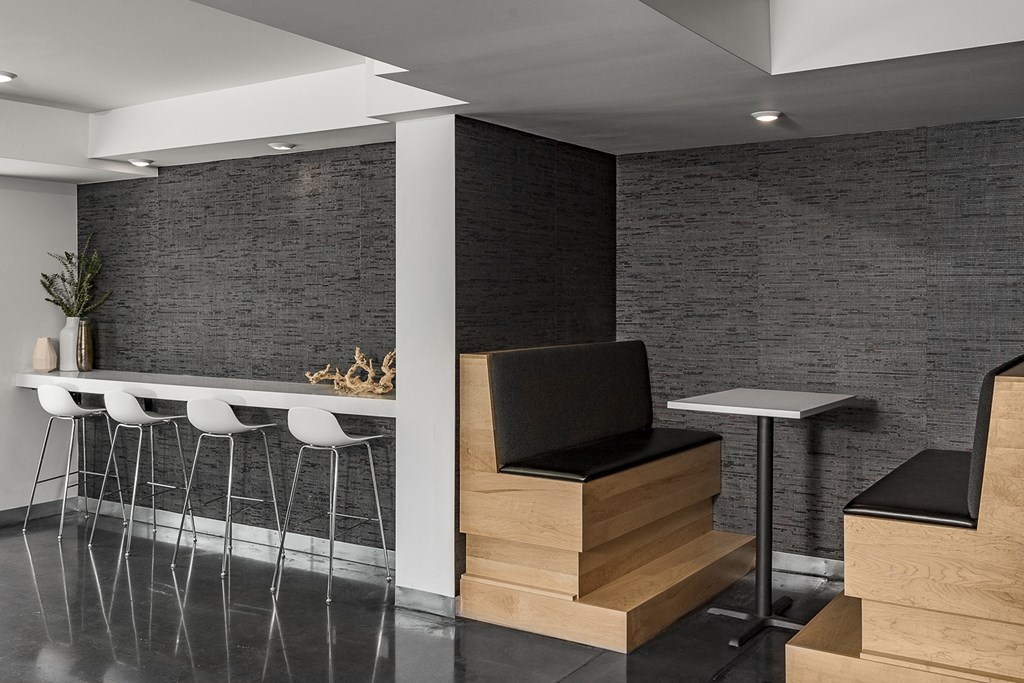 The Reverie Lounge with Fireplace and Complimentary Coffee Bar at The Nexus at Gray's Landing in Downtown Des Moines, IA