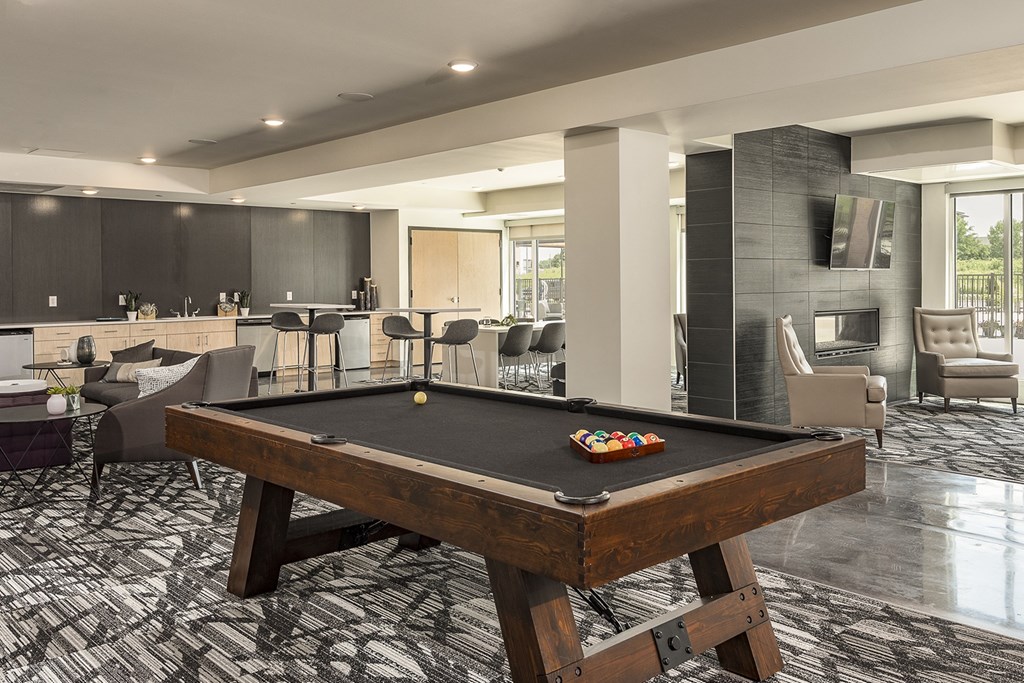 The Reverie Lounge with Fireplace and Complimentary Coffee Bar at The Nexus at Gray's Landing in Downtown Des Moines, IA