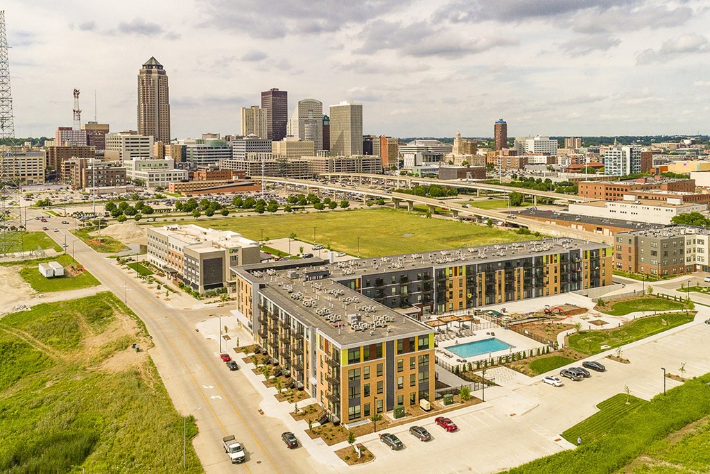 One and two bedroom hi-end apartment homes featuring Energy-Efficient Stainless Steel Appliances,  Granite Kitchen Island, dark cabinets, and much more at The Nexus at Gray's Landing in Downtown Des Moines, IA
