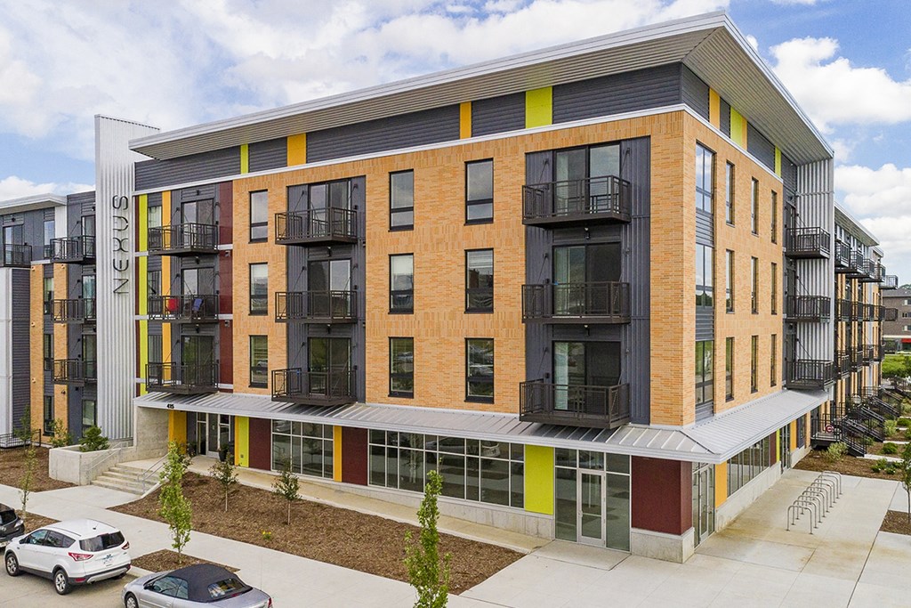 One and two bedroom hi-end apartment homes featuring Energy-Efficient Stainless Steel Appliances,  Granite Kitchen Island, dark cabinets, and much more at The Nexus at Gray's Landing in Downtown Des Moines, IA