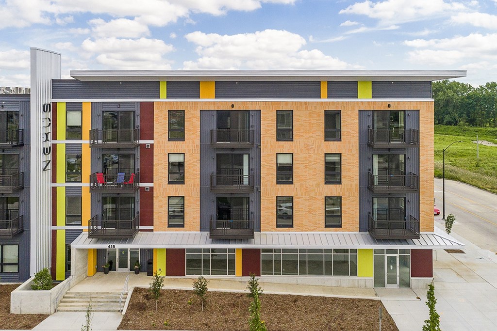 One and two bedroom hi-end apartment homes featuring Energy-Efficient Stainless Steel Appliances,  Granite Kitchen Island, dark cabinets, and much more at The Nexus at Gray's Landing in Downtown Des Moines, IA