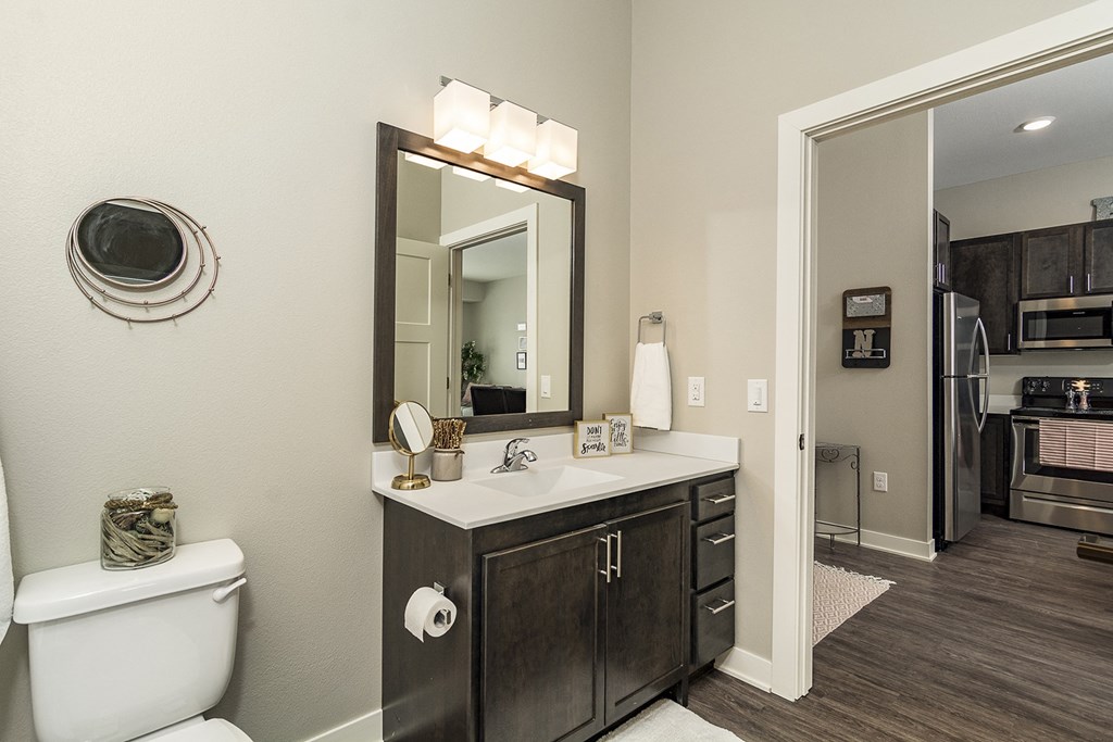 One and two bedroom hi-end apartment homes featuring Energy-Efficient Stainless Steel Appliances,  Granite Kitchen Island, dark cabinets, and much more at The Nexus at Gray's Landing in Downtown Des Moines, IA