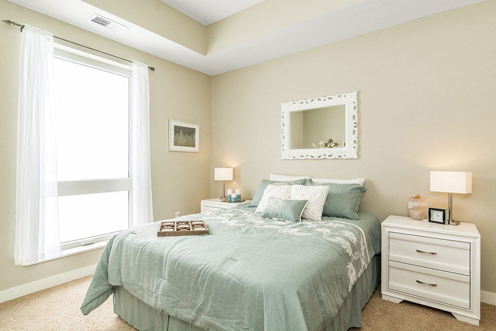 One and two bedroom hi-end apartment homes featuring Energy-Efficient Stainless Steel Appliances,  Granite Kitchen Island, dark cabinets, and much more at The Nexus at Gray's Landing in Downtown Des Moines, IA