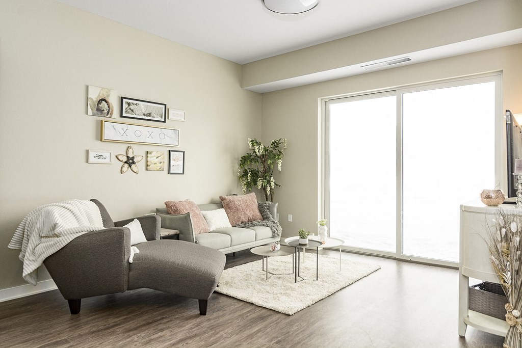 One and two bedroom hi-end apartment homes featuring Energy-Efficient Stainless Steel Appliances,  Granite Kitchen Island, dark cabinets, and much more at The Nexus at Gray's Landing in Downtown Des Moines, IA