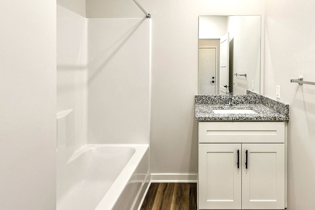 Studio, one and two bedroom apartment homes featuring stainless steel appliances, luxury vinyl floor, granite countertops, large closets and full-size washer and dryer at The Parker in Papillion, NE
