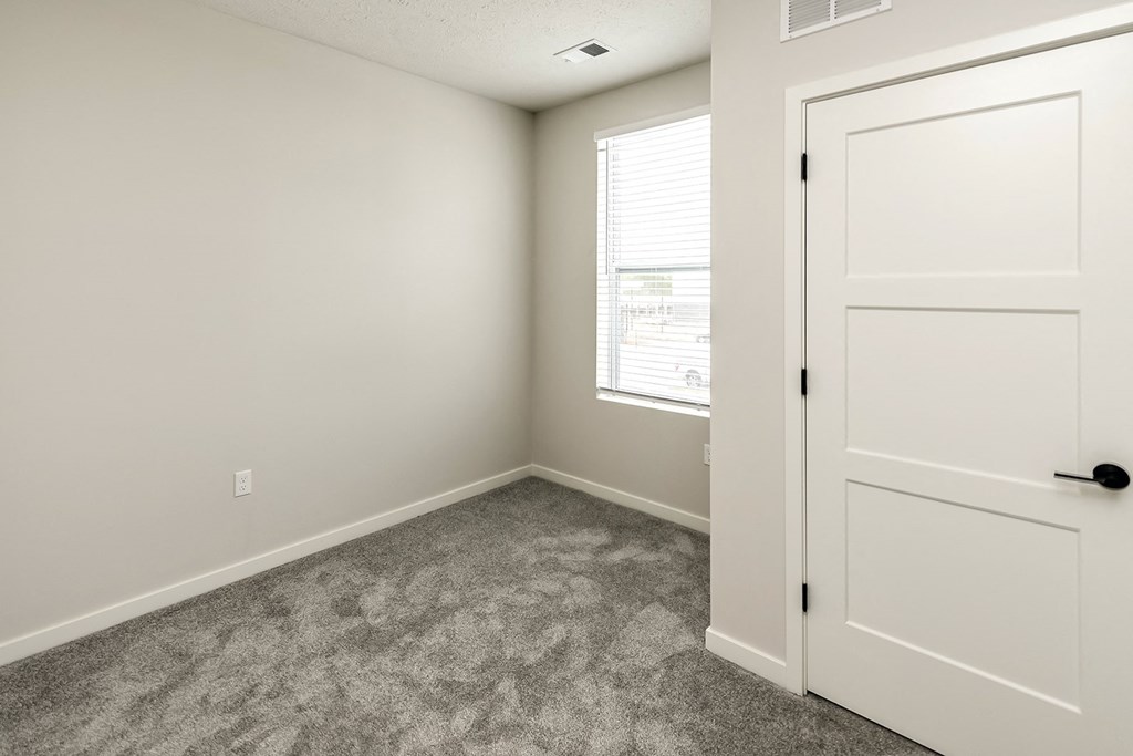 Studio, one and two bedroom apartment homes featuring stainless steel appliances, luxury vinyl floor, granite countertops, large closets and full-size washer and dryer at The Parker in Papillion, NE