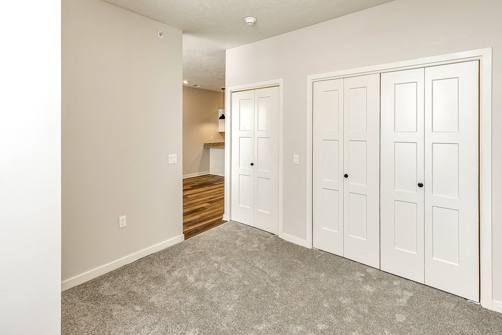 Studio, one and two bedroom apartment homes featuring stainless steel appliances, luxury vinyl floor, granite countertops, large closets and full-size washer and dryer at The Parker in Papillion, NE