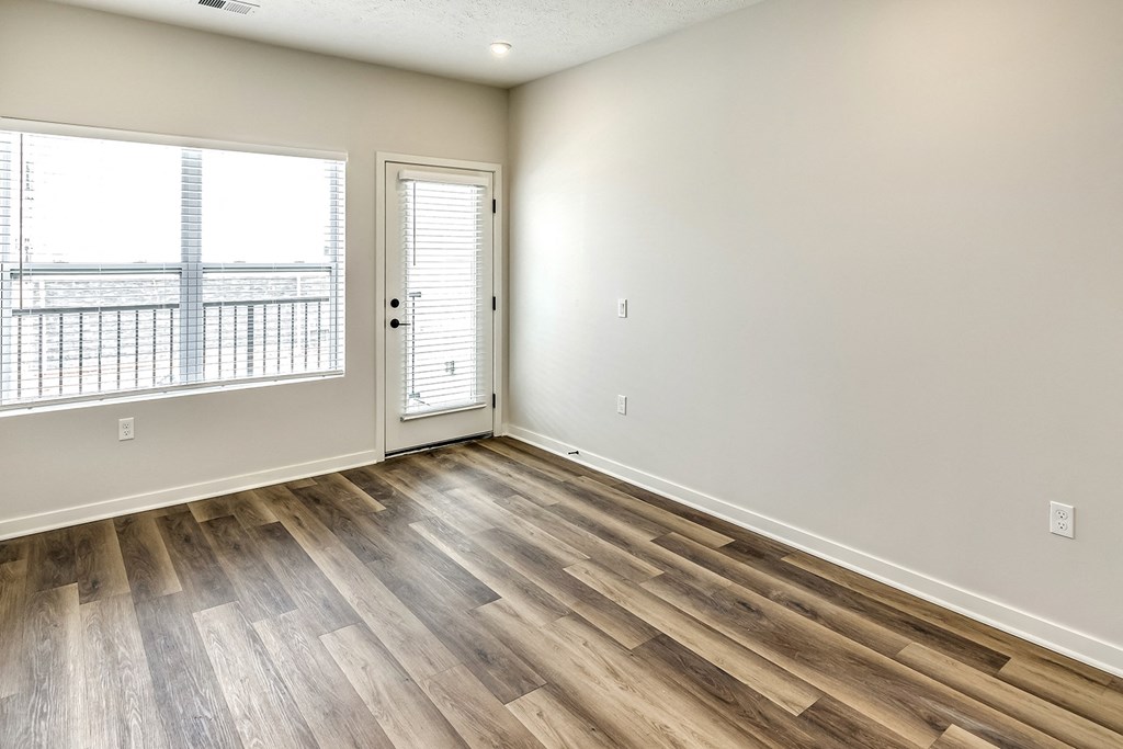 Studio, one and two bedroom apartment homes featuring stainless steel appliances, luxury vinyl floor, granite countertops, large closets and full-size washer and dryer at The Parker in Papillion, NE