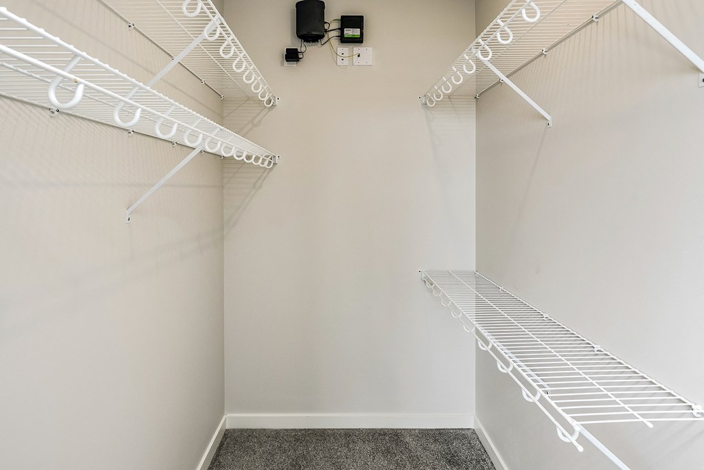 Studio, one and two bedroom apartment homes featuring stainless steel appliances, luxury vinyl floor, granite countertops, large closets and full-size washer and dryer at The Parker in Papillion, NE