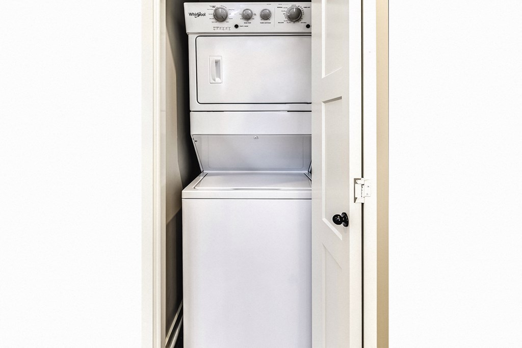 Studio, one and two bedroom apartment homes featuring stainless steel appliances, luxury vinyl floor, granite countertops, large closets and full-size washer and dryer at The Parker in Papillion, NE