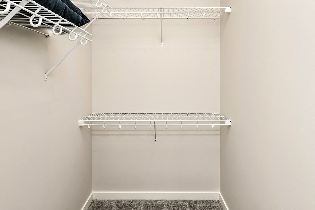 Studio, one and two bedroom apartment homes featuring stainless steel appliances, luxury vinyl floor, granite countertops, large closets and full-size washer and dryer at The Parker in Papillion, NE