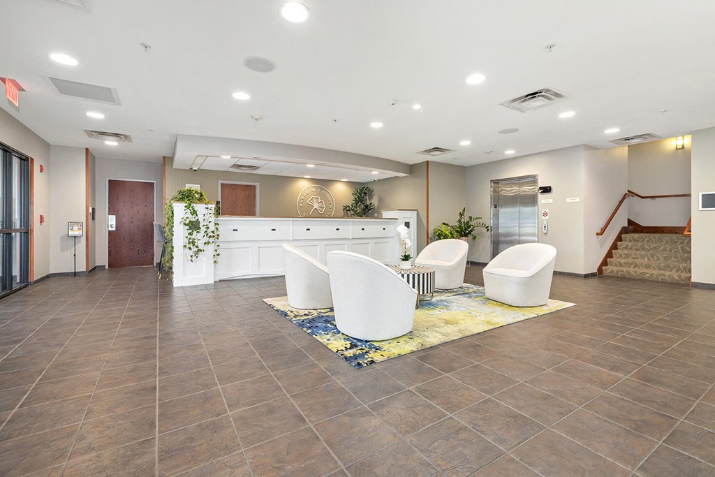 Modern clubhouse featuring community lounge, coffee bar, salon and spa, billiards and poker room, and concierge package room at Parkside Apartments and Shops in Bentonville, AR