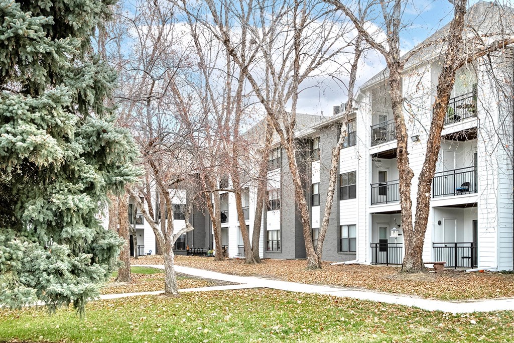 Exterior with trees at Parkwood Terrace in Omaha, NE