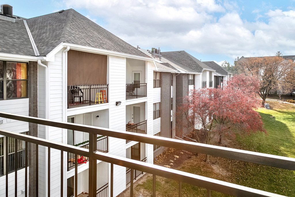 Balcony with a view of nature at Parkwood Terrace in Omaha, NE