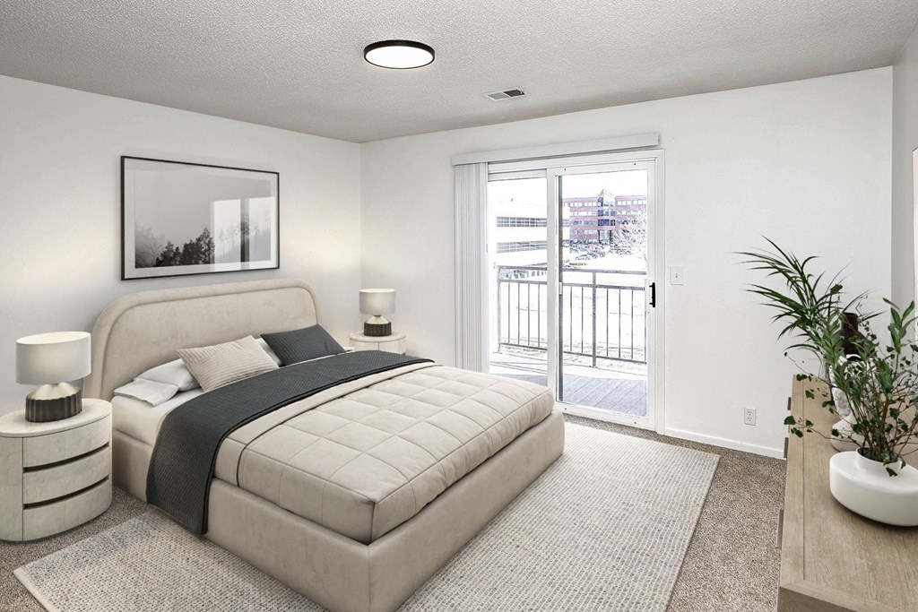 Bedroom with patio at Parkwood Terrace in Omaha, NE