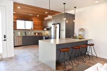 Experience urban agrihood living at our one, two or three bedroom apartments and townhomes featuring amazing apartment and community amenities at Red Barn in Bentonville, AR