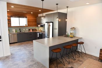 Experience urban agrihood living at our one, two or three bedroom apartments and townhomes featuring amazing apartment and community amenities at Red Barn in Bentonville, AR