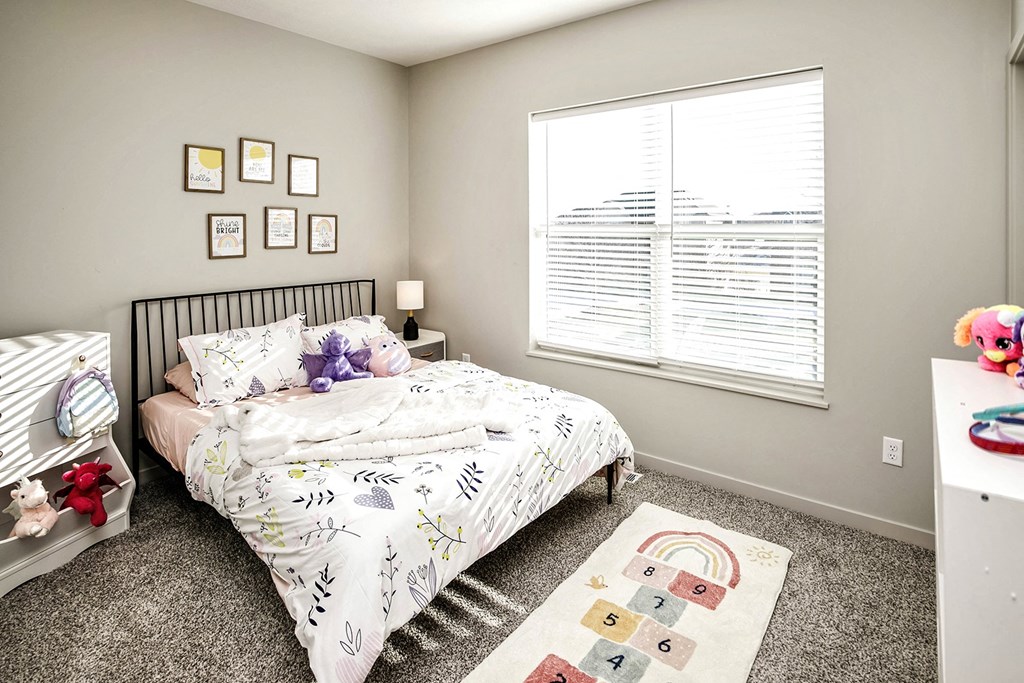 Two and three bedroom townhomes featuring golf course views, fill-size washer and dryer, stainless steel appliances, granite countertops, kitchen island, faux wood flooring and smart-home technology with keyless entry at Sandstone Villas in Omaha, NE