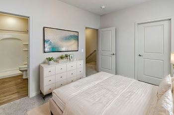 Spacious Bedroom With Comfortable Bed at Sandstone Villas Apartments, Omaha, NE