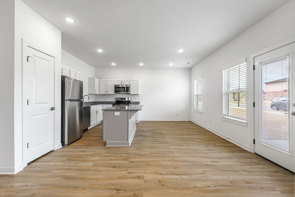 Spacious kitchen with modern lighting at Shadowbrooke Village in Rogers, AR