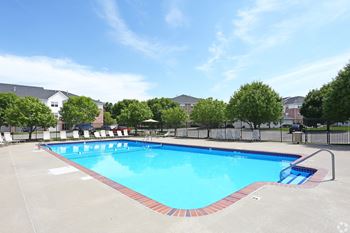 Heated swimming pool at Standing Bear Lake Apartments in Omaha, NE