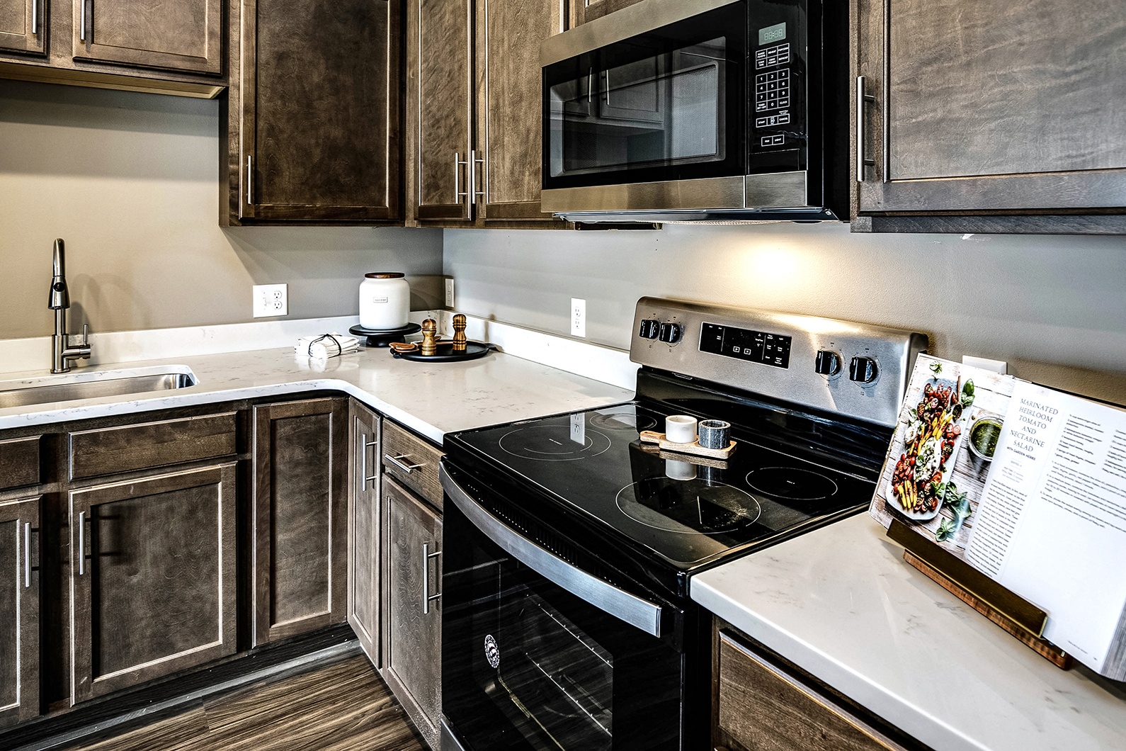 Kitchen with stainless steel appliances at Sterling Prairie Trail in Ankeny, IA