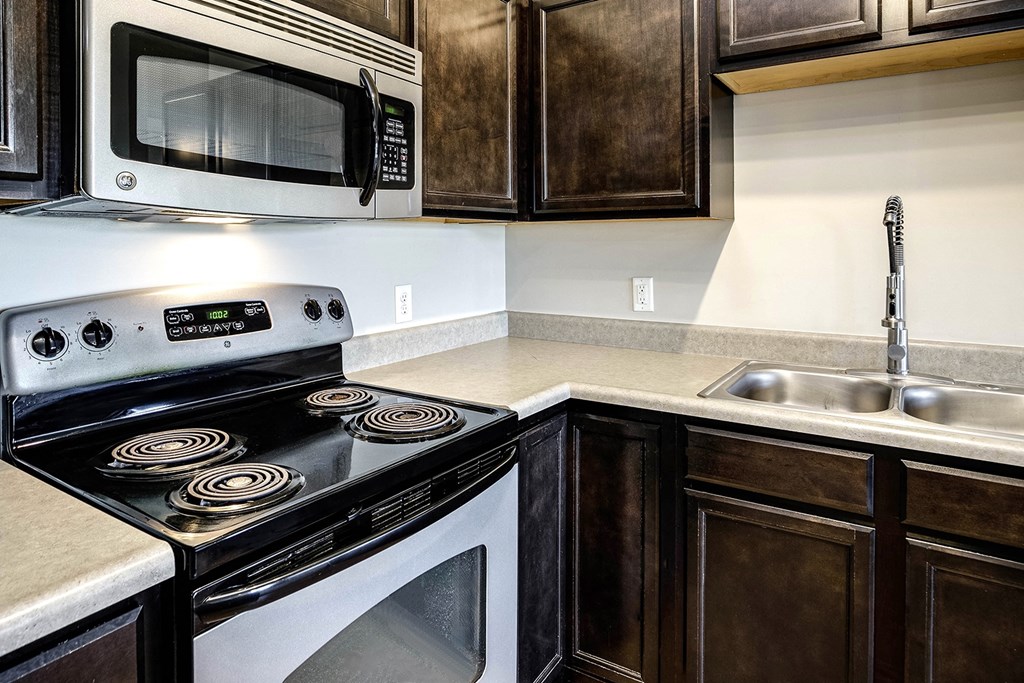 Kitchen with dark cabinets at Tamarin Ridge in Lincoln, NE