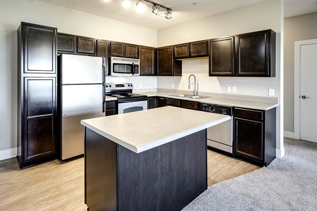 Kitchen with dark cabinets at Tamarin Ridge in Lincoln, NE