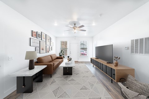 a living room with a couch and a tv