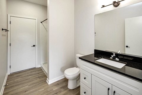 Spacious one and two-bedroom apartments featuring three interior schemes, granite countertops, stainless steel appliances, large kitchens, high-end lighting, vinyl plank flooring and much more at The Brink at Ridgeview in Plattsmouth, NE