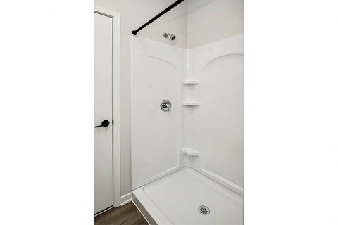 Spacious one and two-bedroom apartments featuring three interior schemes, granite countertops, stainless steel appliances, large kitchens, high-end lighting, vinyl plank flooring and much more at The Brink at Ridgeview in Plattsmouth, NE