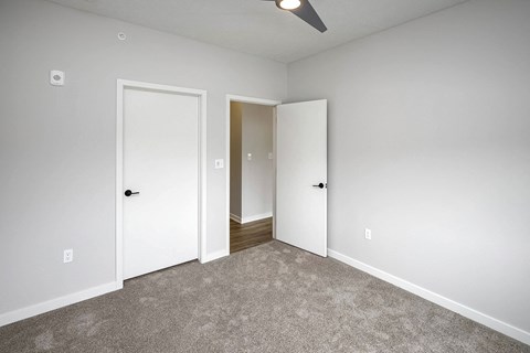 Spacious one and two-bedroom apartments featuring three interior schemes, granite countertops, stainless steel appliances, large kitchens, high-end lighting, vinyl plank flooring and much more at The Brink at Ridgeview in Plattsmouth, NE